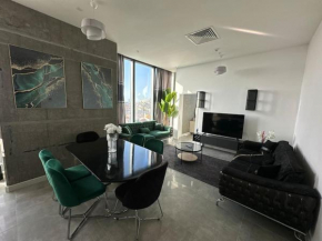 Elegant 2 bedroom apt Sinpas queen gym pools
